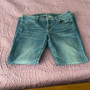 American Eagle Next level stretch jeans.  Medium blue color. Size 10 Regular